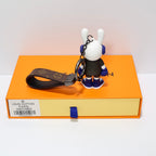 Rear view of rabbit keychain showing textured dark jacket