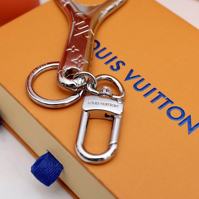 Bottle opener keychain showing silver-tone clasp and connecting links