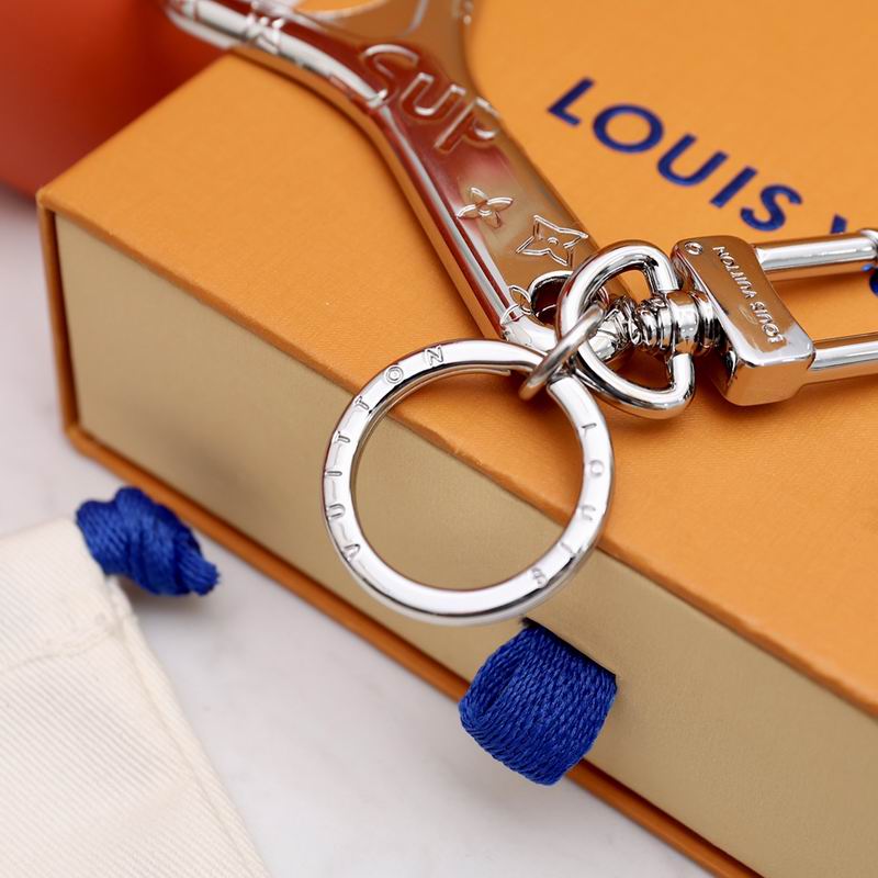 Close-up of bottle opener keyring and engraved metal handle