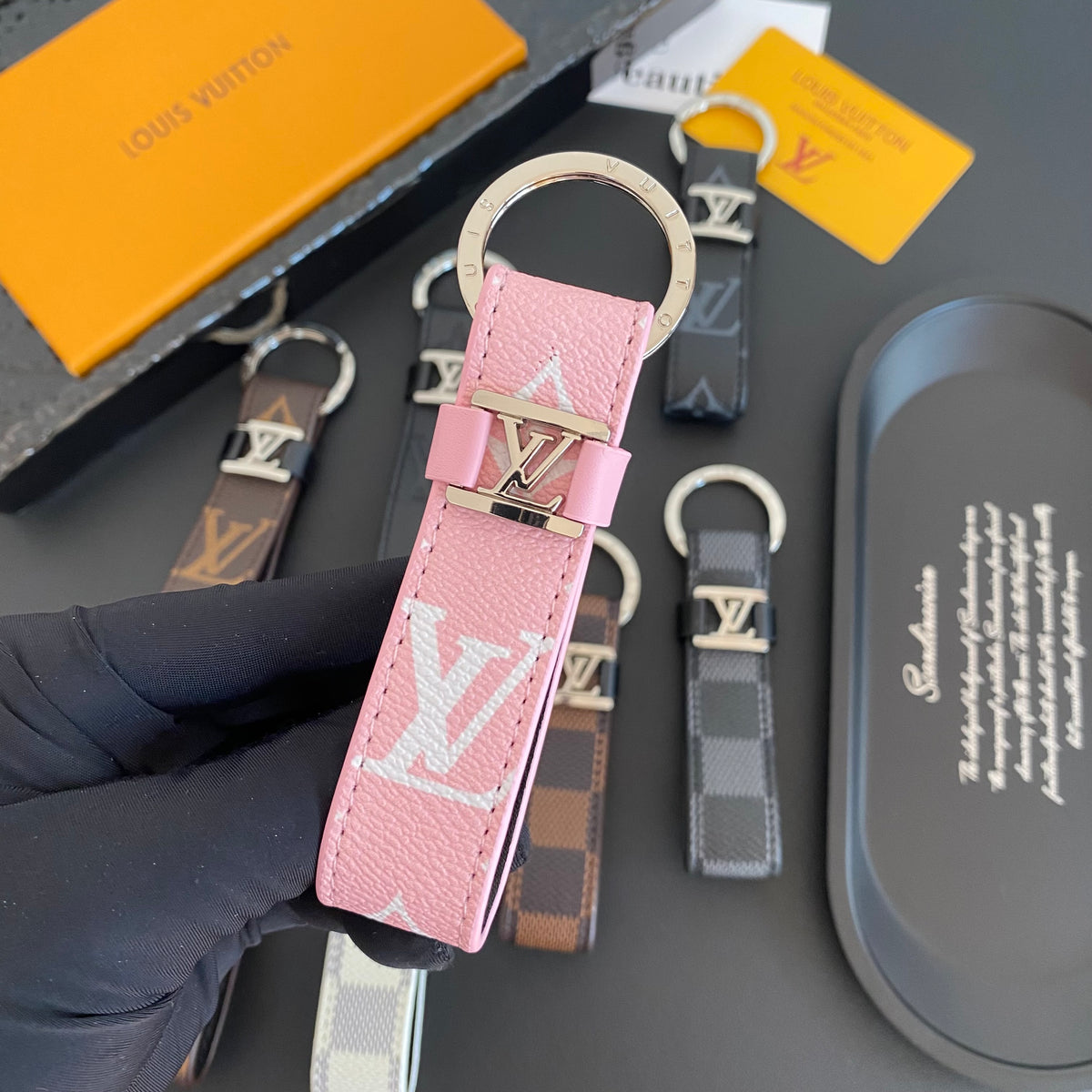 Pink loop key holder with pale monogram lettering