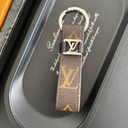 Brown monogram loop key holder with silver-tone LV detail