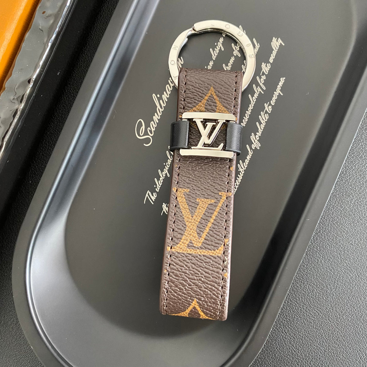 Brown monogram loop key holder with silver-tone LV detail