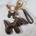 Brown monogram dog keychain with smaller dog charm and wrist strap