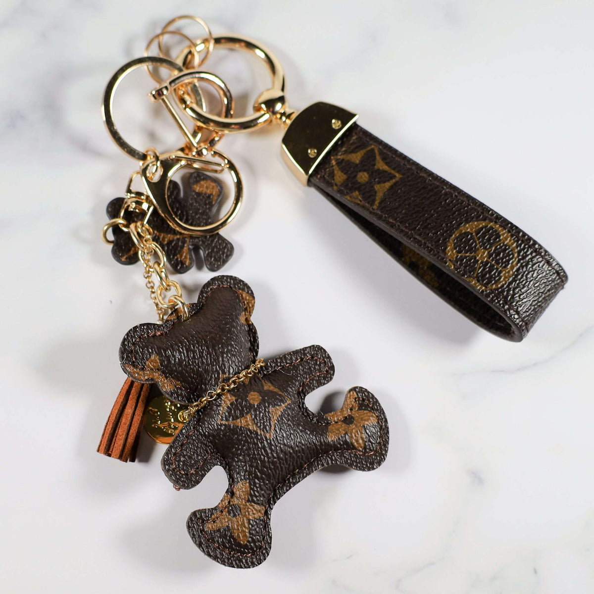 Brown bear keychain with tassel, smaller charm, and monogram strap
