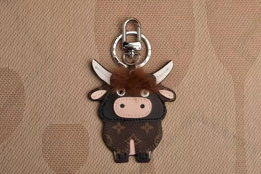 Cow keychain showing pink muzzle and silver-tone clasp