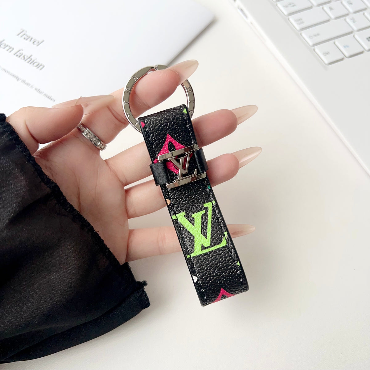 Black key holder with oversized colorful LV letters