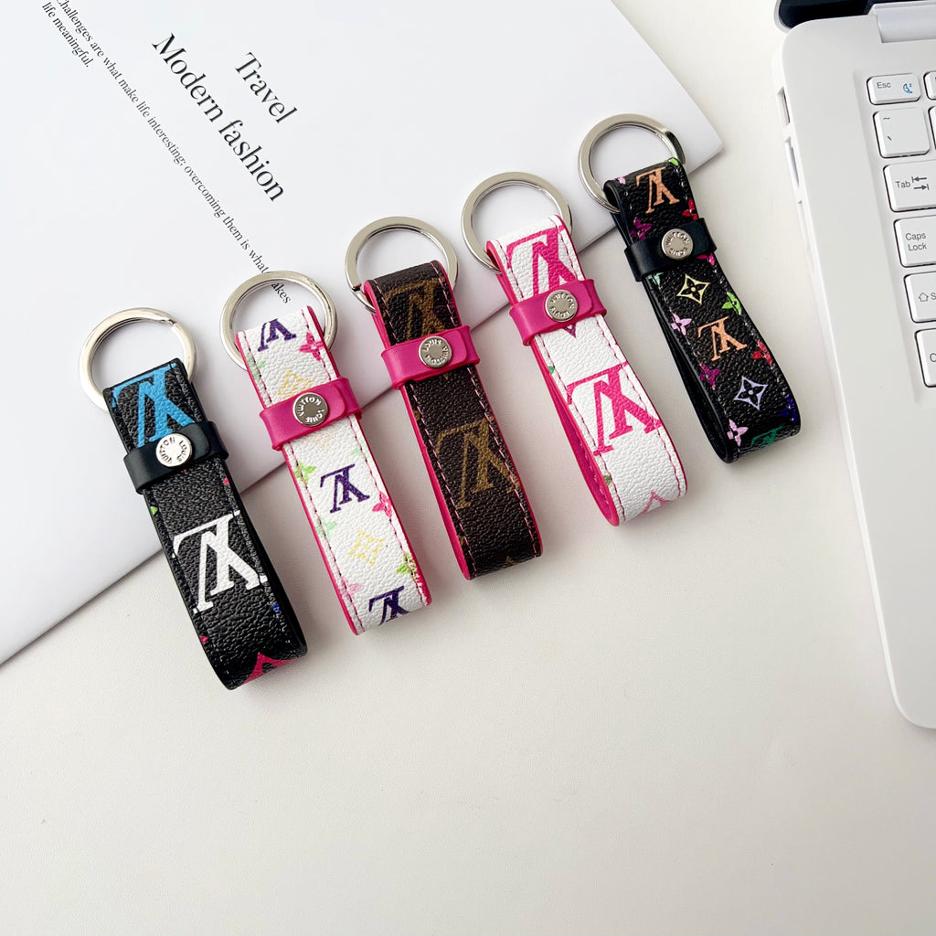 Monogram strap key holders with silver-tone LV hardware