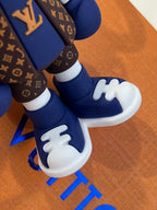 Blue shoes and white laces on bunny boxer keychain