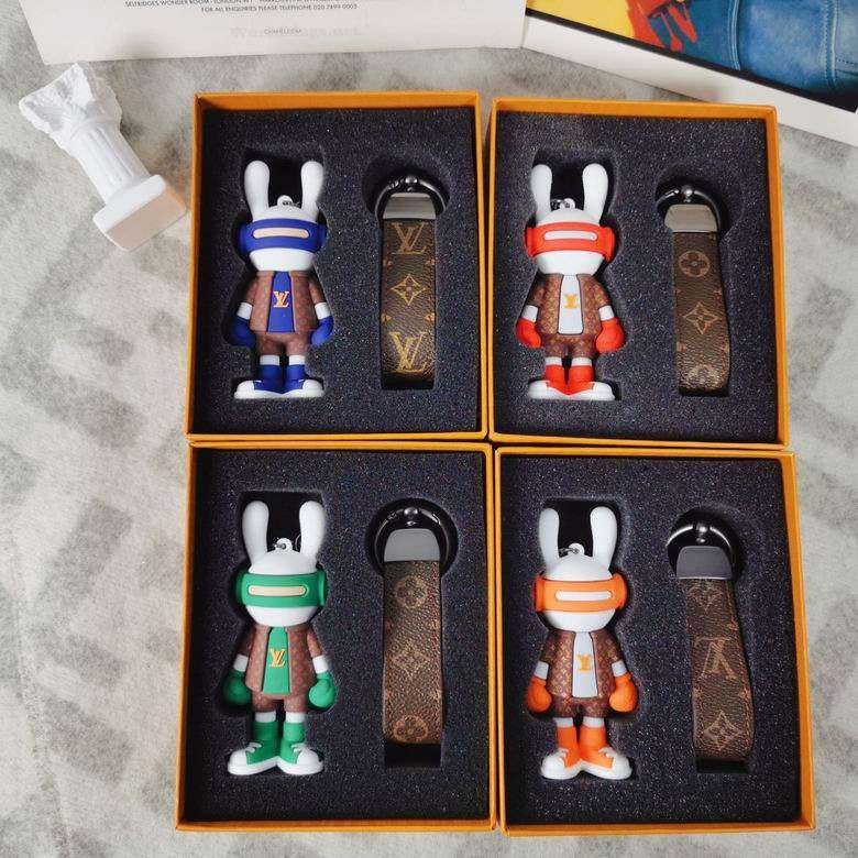 Bunny boxer keychains in blue, red, green, and orange