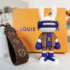 Blue bunny boxer keychain with brown monogram strap