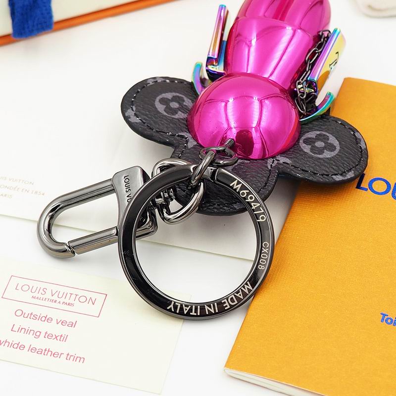 Reverse detail of pink Vivienne charm and engraved keyring