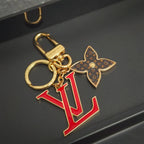 Red LV letter keychain with brown monogram flower charm