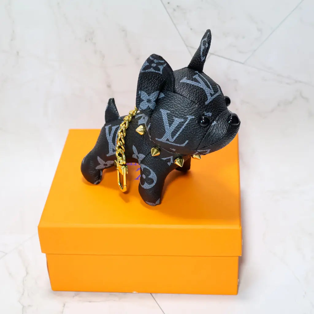 Black monogram bulldog keychain shown from the front side
