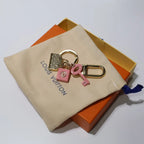 Pink lock and key charms with miniature handbag pendant