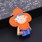 Orange Vivienne charm showing blue skirt and pale face