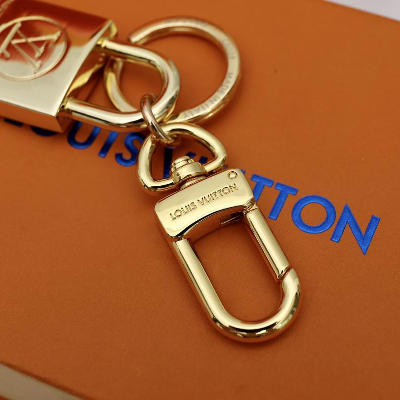 Close-up of padlock keychain clasp and connecting rings