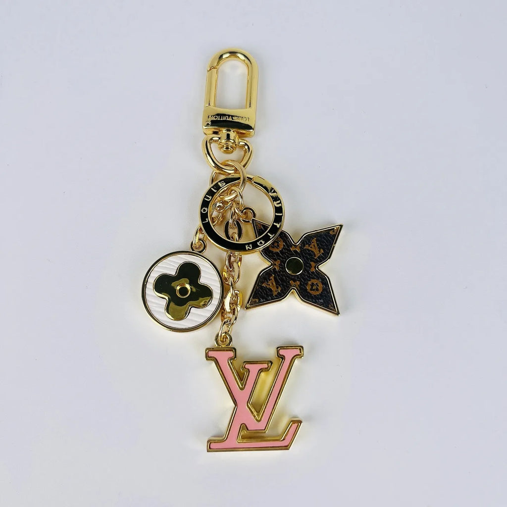 Pink LV ornament keychain showing flower charms and clasp